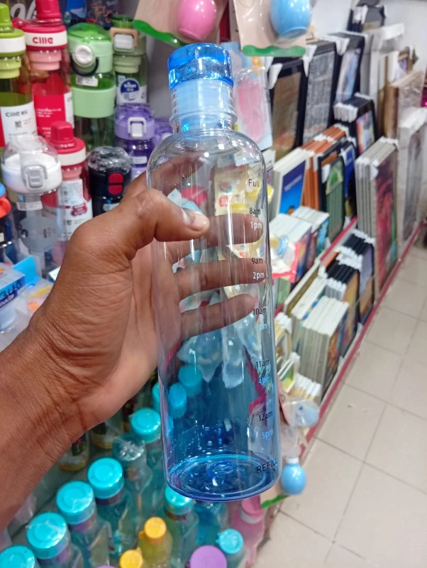 Transparent Blue Motivational Water Bottle, Clear Blue Drinking Bottle with Time Marker, Minimalist Blue Hydration Tracker Bottle.