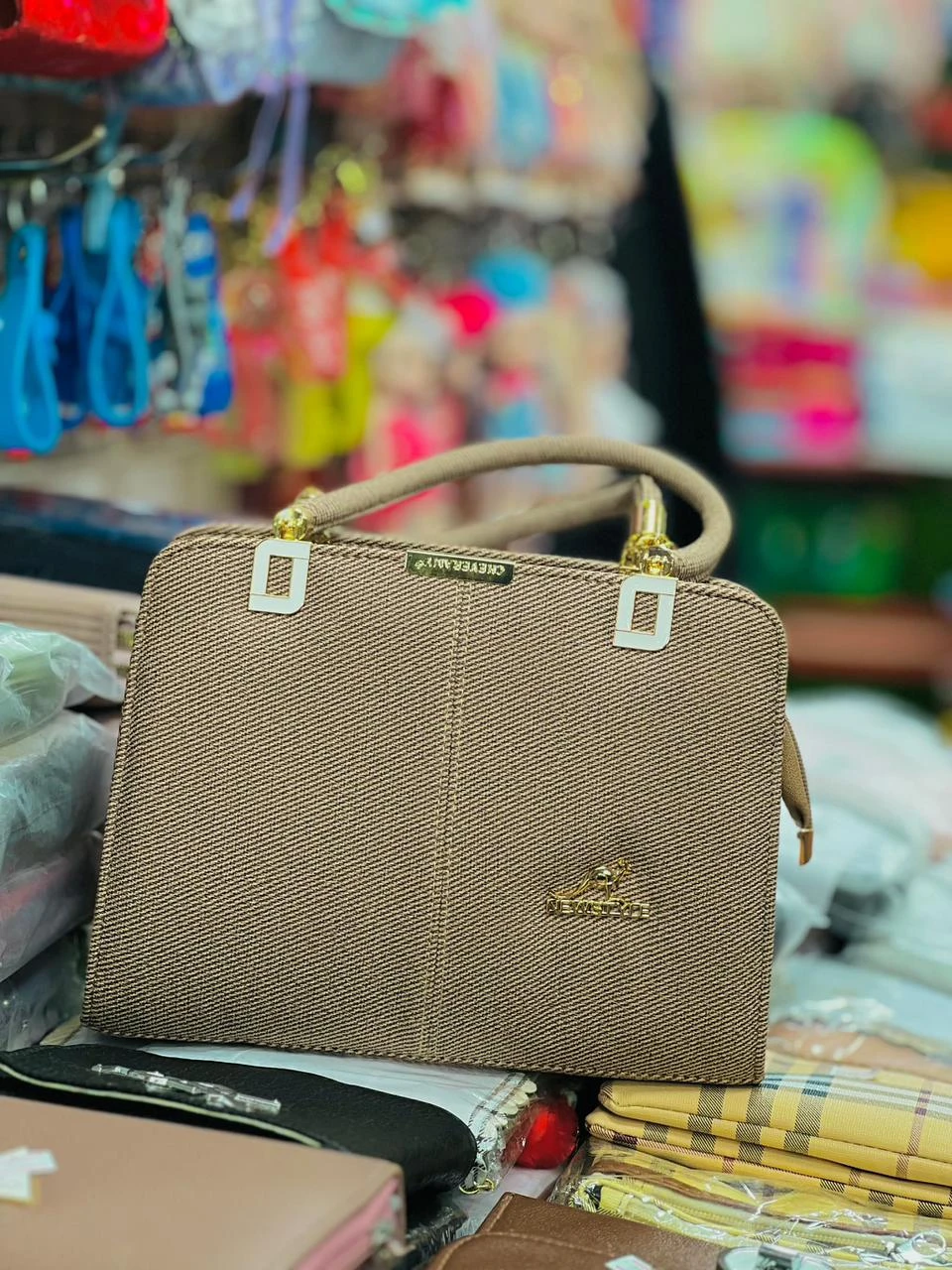 Kangaroo Elite: Textured Earthy Brown Handbag